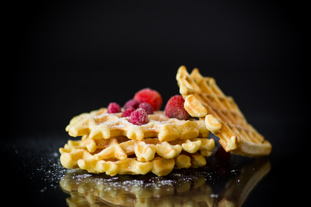 cooked sweet Viennese waffles on a blackの写真素材