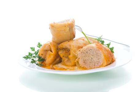 Stuffed cabbage leaves with minced meat and rice in tomato sauce.の写真素材