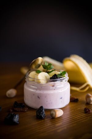 home sweet banana yogurt in a glass jarの写真素材