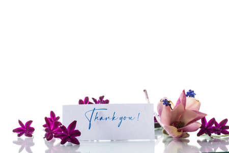 beautiful bouquet of spring flowers with congratulations for motherの写真素材