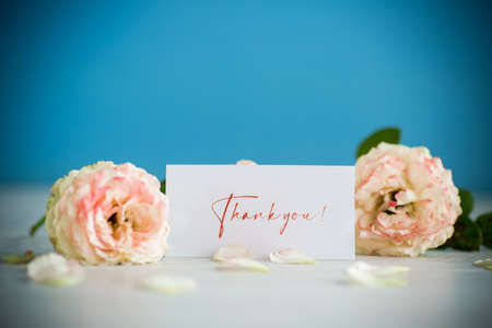 bouquet of beautiful roses on a wooden tableの写真素材