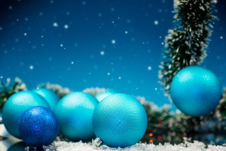 New Year's toys, decorations and other items on a blue abstract background. New Year background.の写真素材