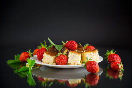 red ripe strawberry spring on a white background.の写真素材