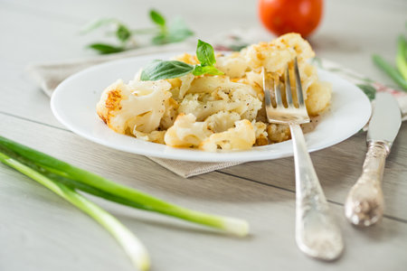 Diet boiled cauliflower fried in oil with spices.の写真素材