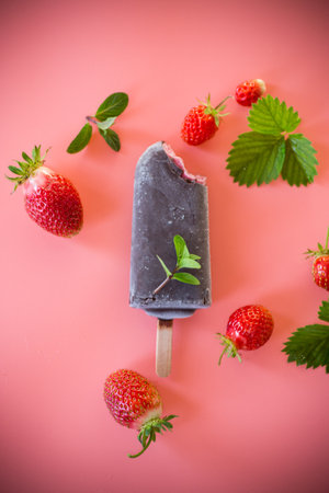 Strawberry ice cream with chocolate glaze and mint.の写真素材