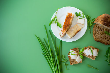 Simple village treat with rye bread, lard and onions.の写真素材