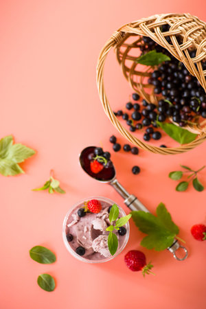Berry ice cream with natural ingredients on background.の写真素材
