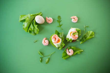 Delicious toast with salad, shrimp and boiled egg.の写真素材