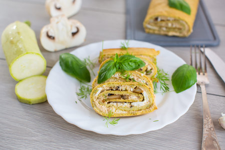 Summer vegetable zucchini roll with cheese.の写真素材