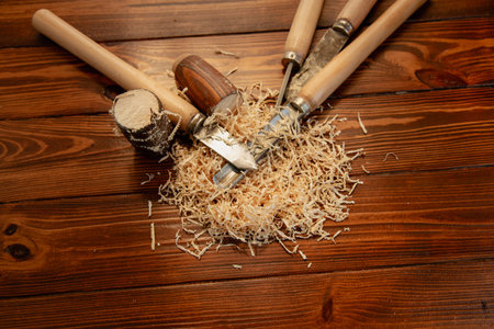 Workshop with tools on wooden table.