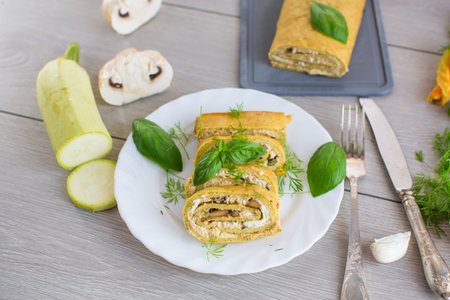 Homemade zucchini roll with mushroom filling.の写真素材