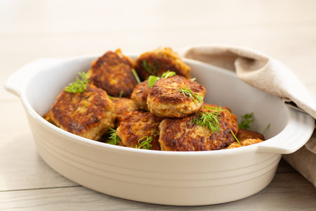 Hot meat cutlets with a golden crust in a rustic style.