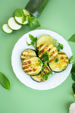 Delicious crispy grilled zucchini without meat.の写真素材