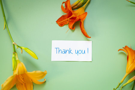 Composition of lilies and congratulations on a green background for mom.