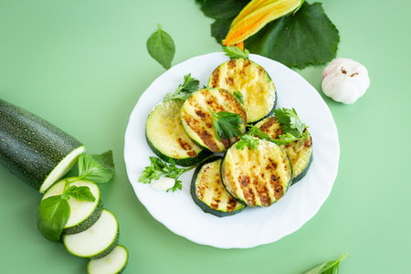 Fried zucchini slices in a healthy food style.の写真素材