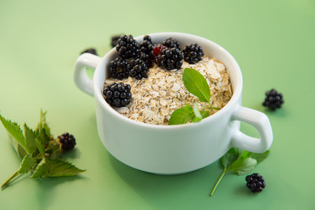 Natural breakfast oatmeal with seasonal berries.