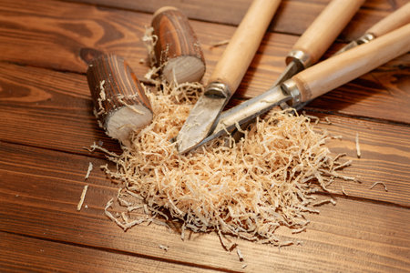 Carpentry work with wood tools on wooden table.
