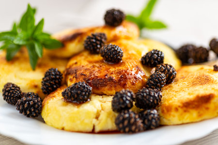 Homemade cheesecakes served with natural jam.の写真素材