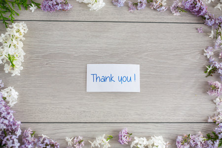 Flower frame of white and purple lilac.