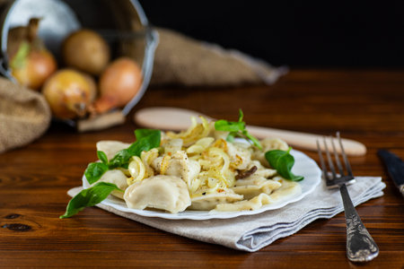 Delicious dumplings with herbs and fried onions.の写真素材