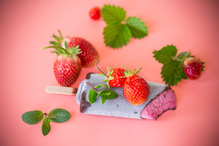Summer strawberry dessert on a pink background.の写真素材