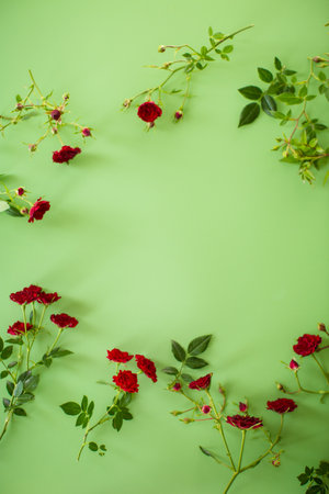Floral arrangement of miniature red roses from above.の写真素材