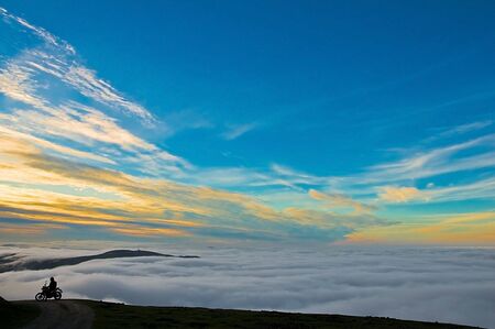 Biker travelling through the countrysideの写真素材