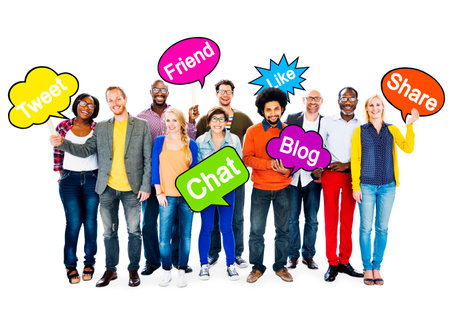 Group Of Multi-Ethnic People Holding Speech Bubbles With Words Related To Social Networking 
