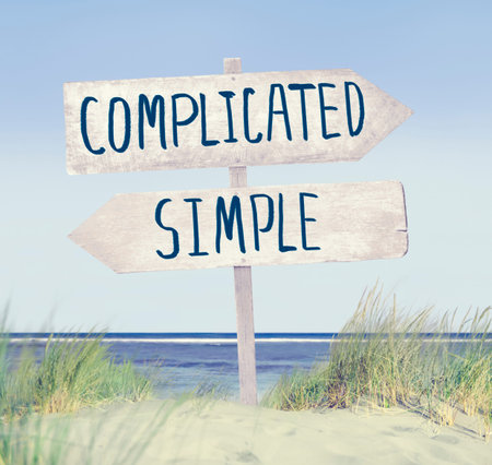 Direction Sign on Beach with Complicated and Simple Text
