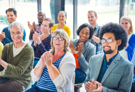 Group of Cheerful People Clapping with Gladness