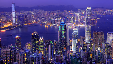 Hong Kong victoria harbor at night .
