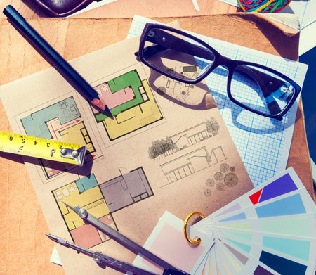 Messy Architect's Table with Work Tools