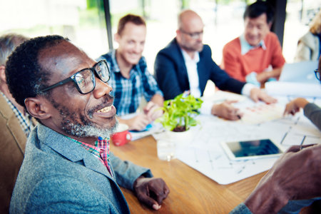 Happy and Casual Businessmen in a Conference