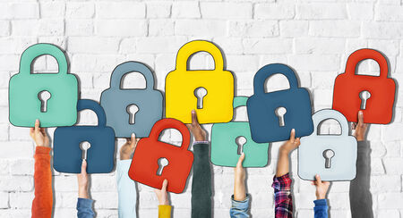 Group of Hands Holding Padlock
