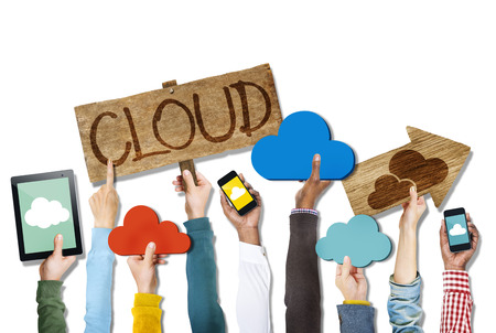 Group of Hands Holding Digital Devices with Cloud Concept