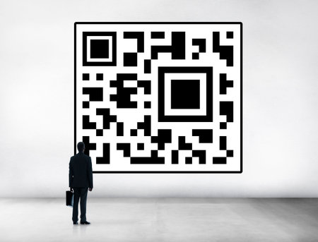 Business man looking at a QR code