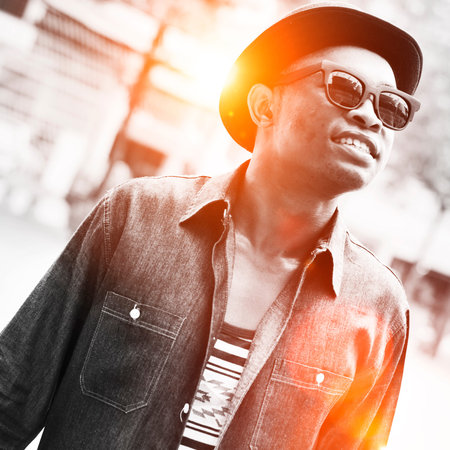 African Man Relaxation Outdoors Happiness Concept