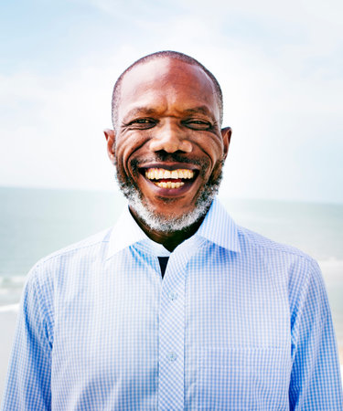 African Man Beach Vacation Lifestyle Portrait Concept