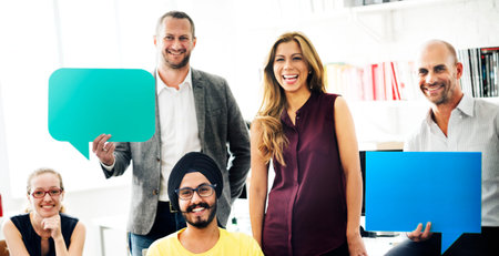 Business Team Holding Speech Bubble Sign Concept