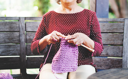 Senior Adult Knitting Leisure Activity Needle Concept