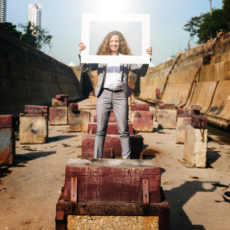 Businesswoman Picture Frame Holding Concept