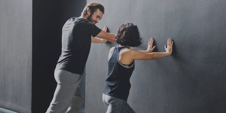 Athletic Attractive Exercise Fitness Couple Concept