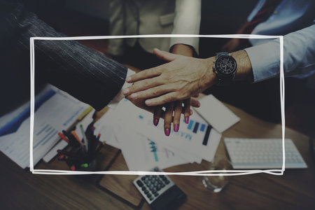 Business Partnership Handshake Team United Concept