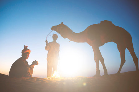 Two Indigenous Indian Men With Their Camel Concept