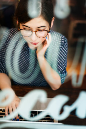 Woman Using Laptop Working Browsing Concept