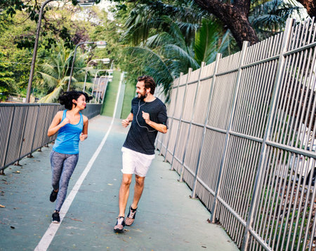 Couple Exercise Jogging Running Park Concept