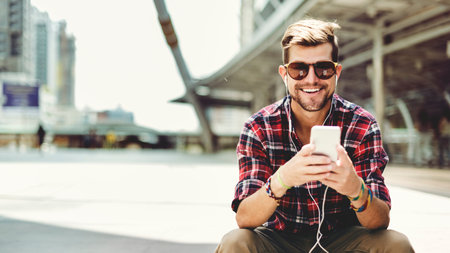 Man Sitting Listening Music Earphones Concept