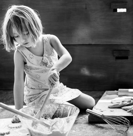 Little Girl Baking Cookies Concept