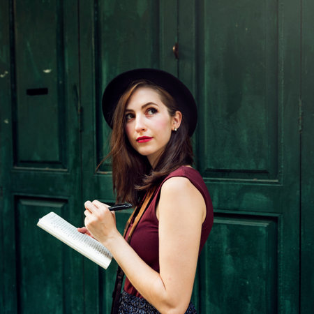 Woman Making Notes Outside City Concept
