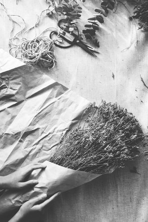Flower Bouquet Wrapping Hand Concept